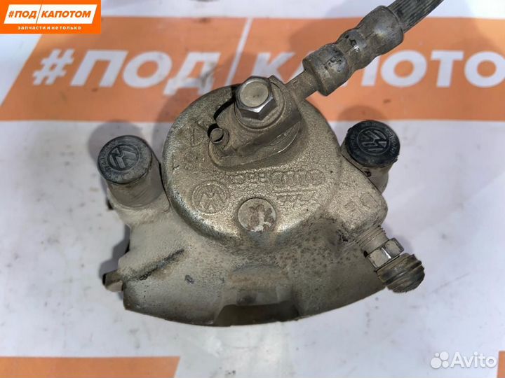 Суппорт тормозной передний левый Volkswagen Polo 5