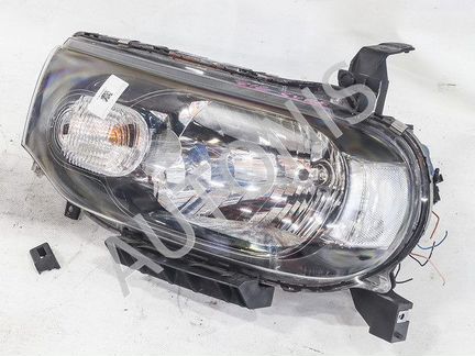 Фара головного света левая Nissan Cube Z12