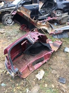 Крыло заднее левое четверть Mitsubishi Carisma DA